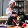 Hilda-Baci, a Nigerian chef who cooked for a 100-hour straight to set new world record. Credit: BBC