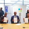 Officials of UNDP-Nigeria and African Development Center of Microsoft during signing of the MoU