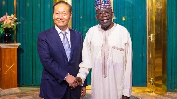 Special Envoy of Chinese President XI Jinping and Vice Chairman of Chinese National People's Congress, Peng Qinghua with the President of Nigeria, Bola Ahmed Tinubu.