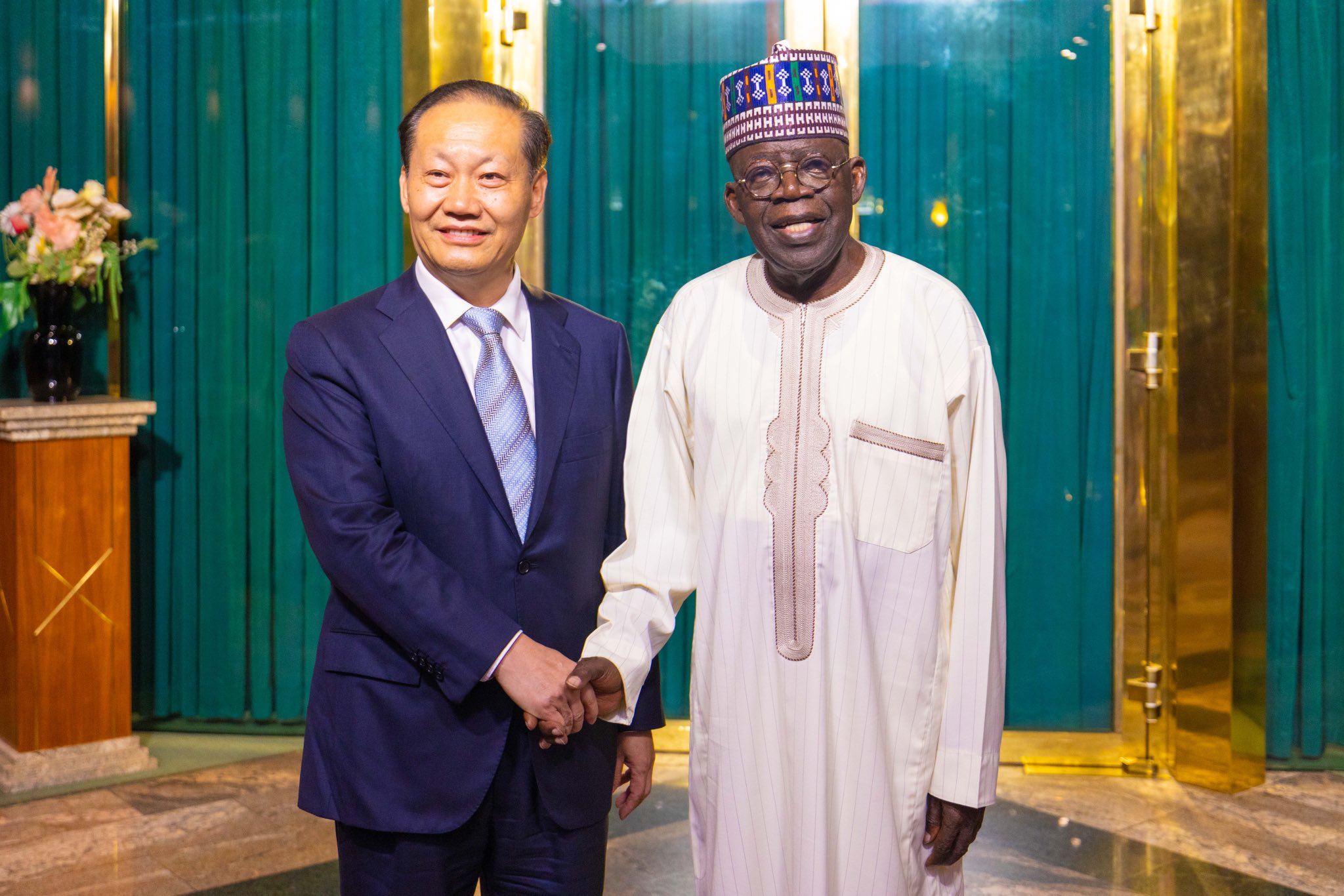 Special Envoy of Chinese President XI Jinping and Vice Chairman of Chinese National People's Congress, Peng Qinghua with the President of Nigeria, Bola Ahmed Tinubu.