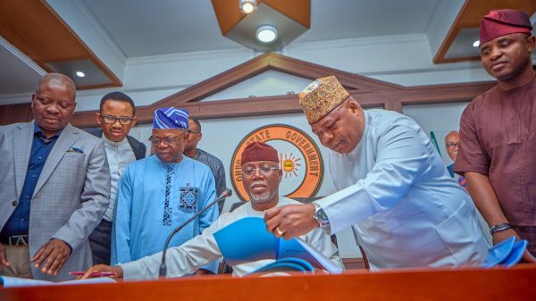 Ondo State Governor, Lucky Aiyedatiwa and Assembly Speaker, Olamide Oladjiji in Akure During the signing of 2025 Budget and other bills into law on 30th December 2024